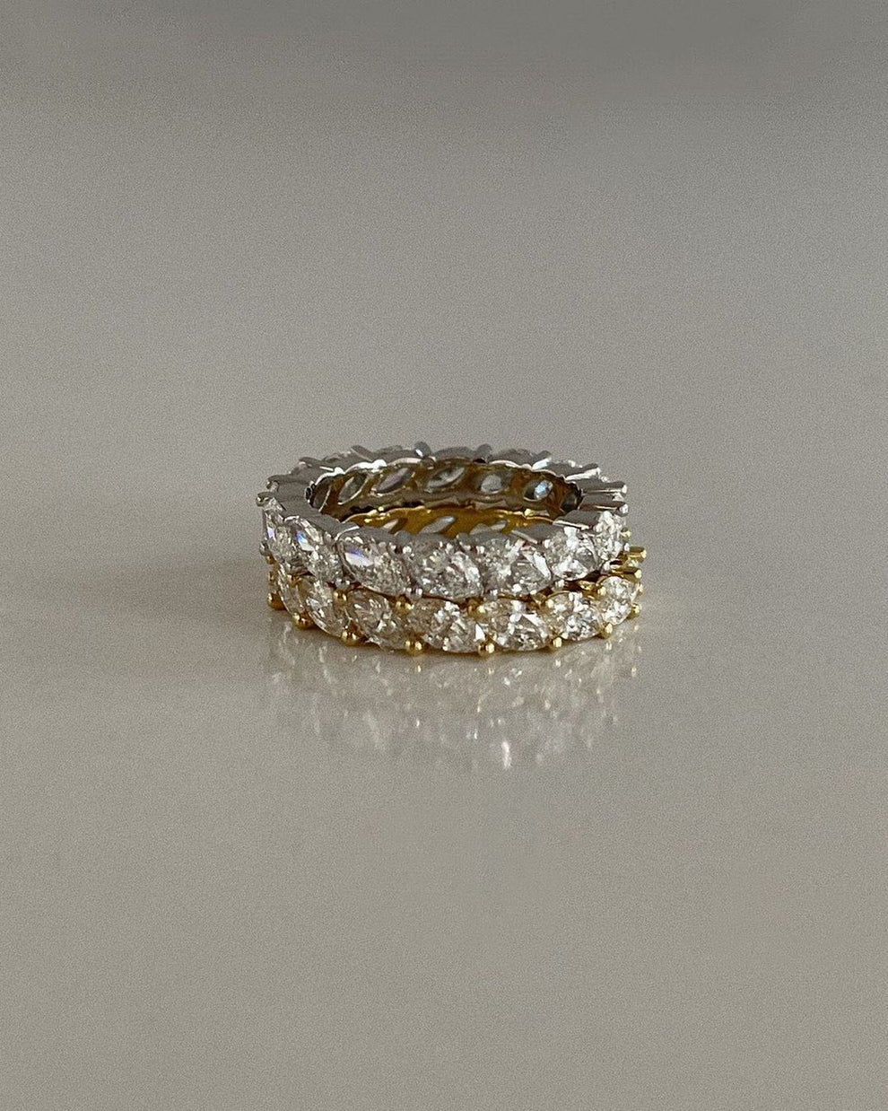 alt="Marquise Eternity Ring in white and yellow gold"