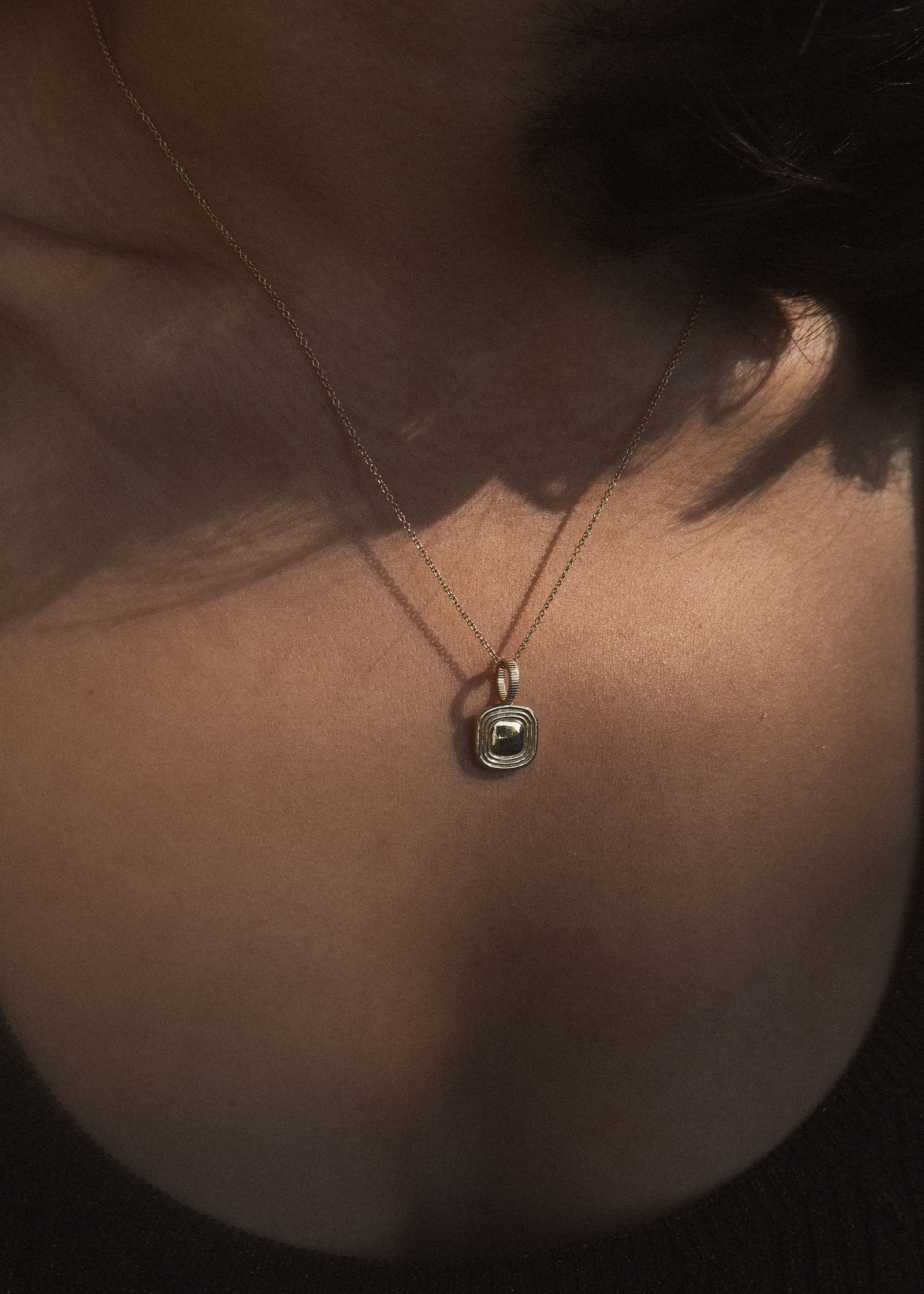 Duyen Ha wearing a Kinn x Shoppe Amber Interiors The Estate Necklace Silver
