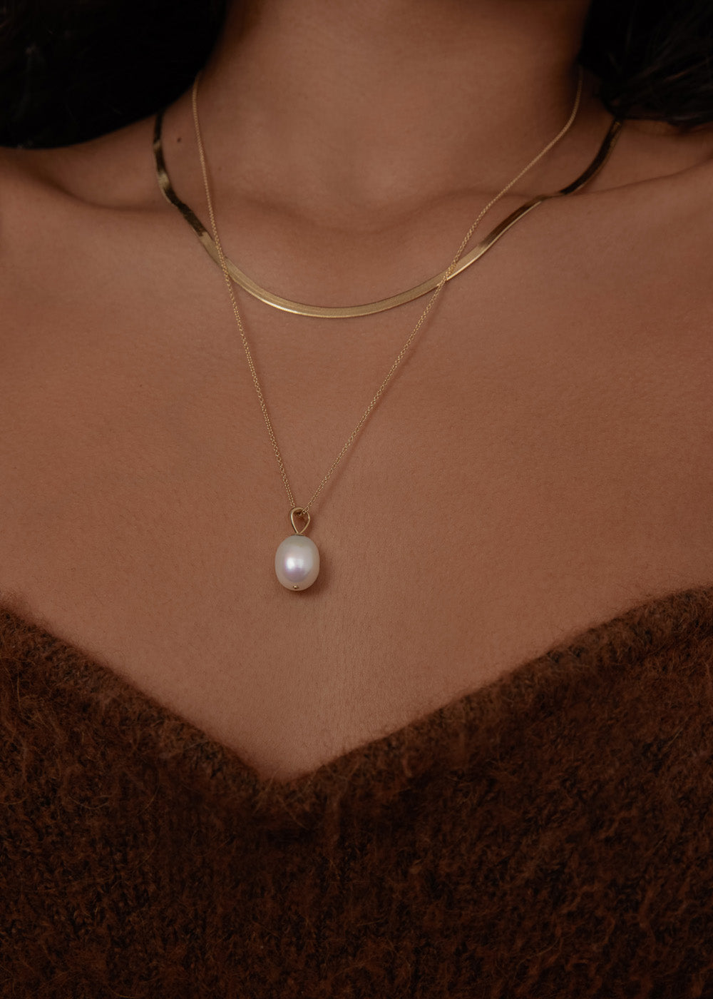 alt="Carter Flat Herringbone Chain II and Baroque Pearl Drop Necklace"