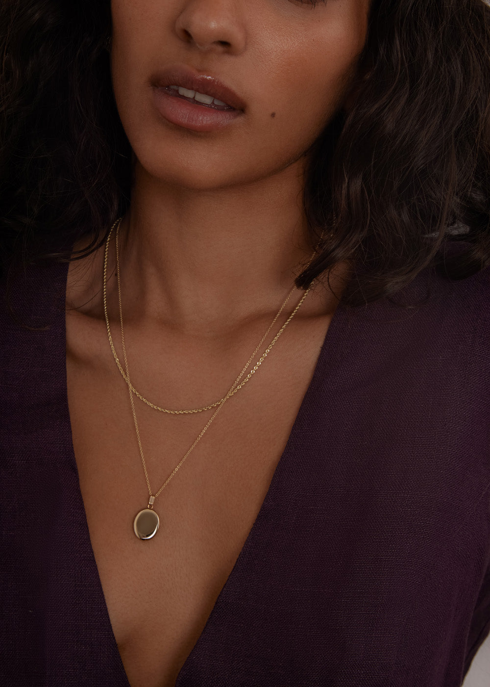 alt="Maison Oval Locket & Petite Rope Chain Necklace Stack"