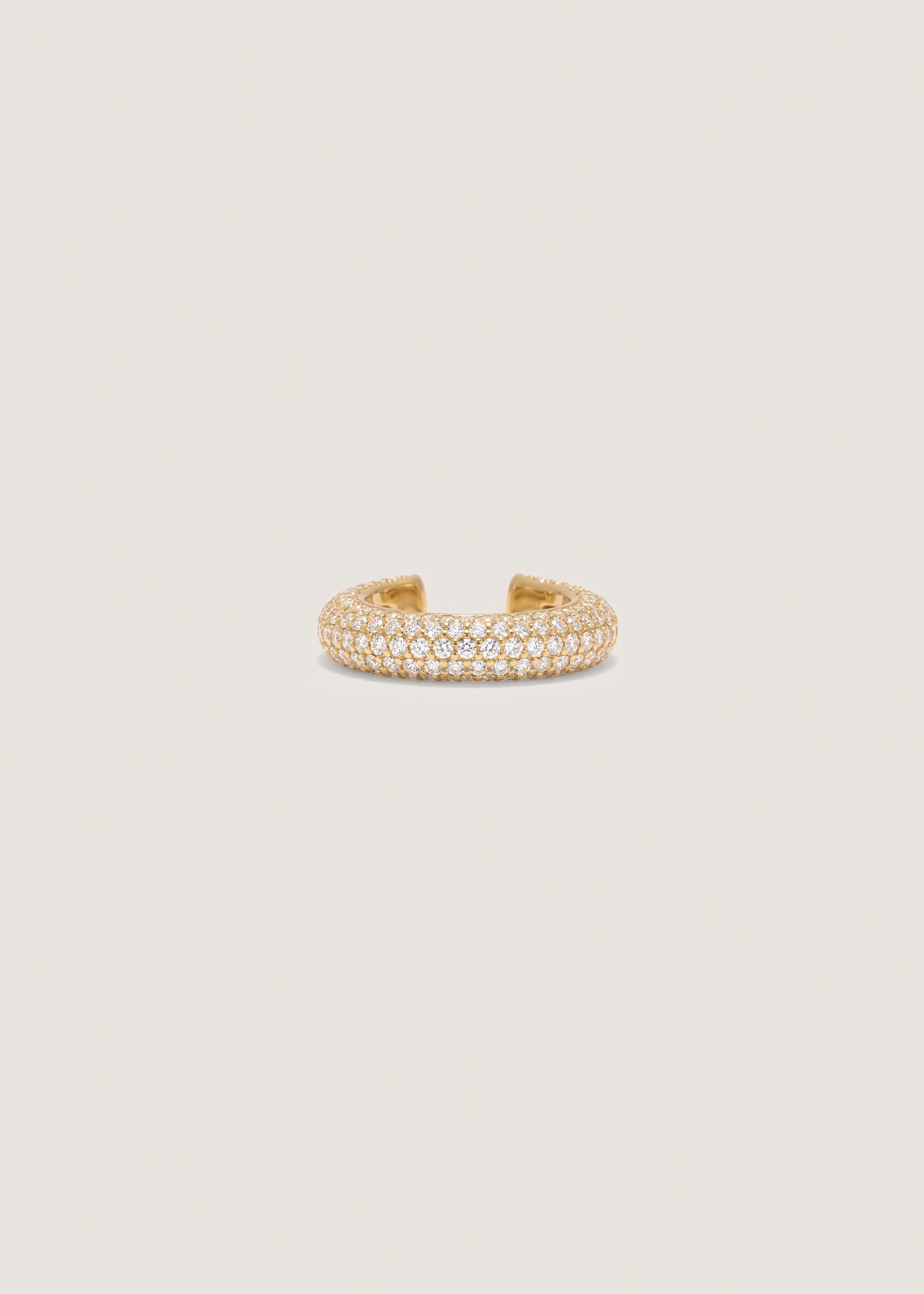Front angle of a Kinn x Prince 14k Gold Love Pavé Diamond Earring Cuff