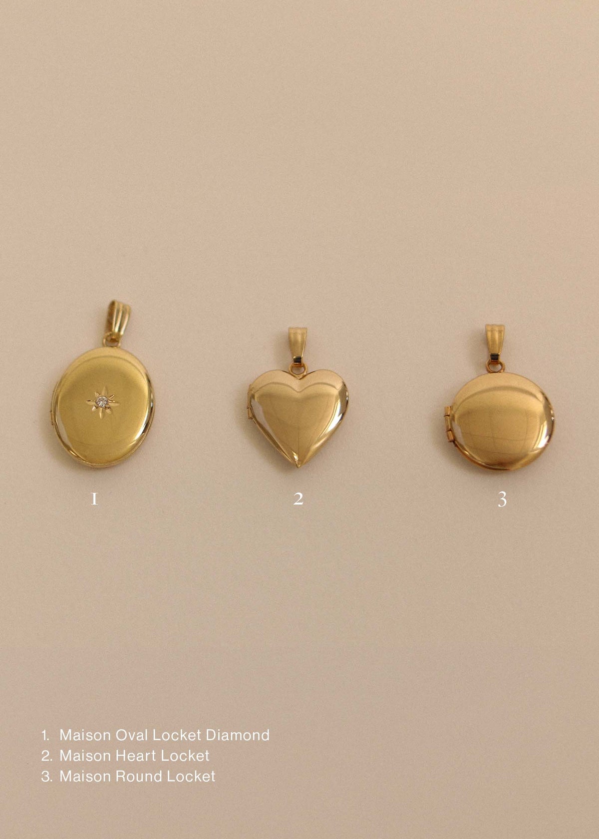 A Kinn 14k Gold Maison Oval Locket Diamond, Maison Heart Locket, and a Maison Round Locket laying flat in a row against a beige background.  Image is numbered 1, 2, 3 and listed with the names of the product at the bottom left corner.