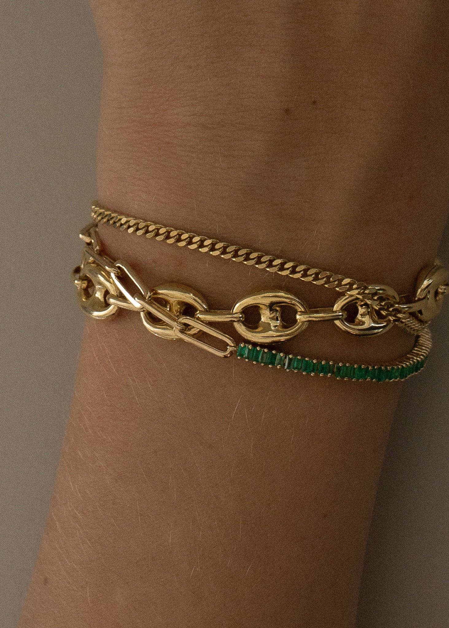 alt="Capri Curb Chain Bracelet with Puffed Mariner Chain Bracelet and Serena Emerald Tennis Link Bracelet II"