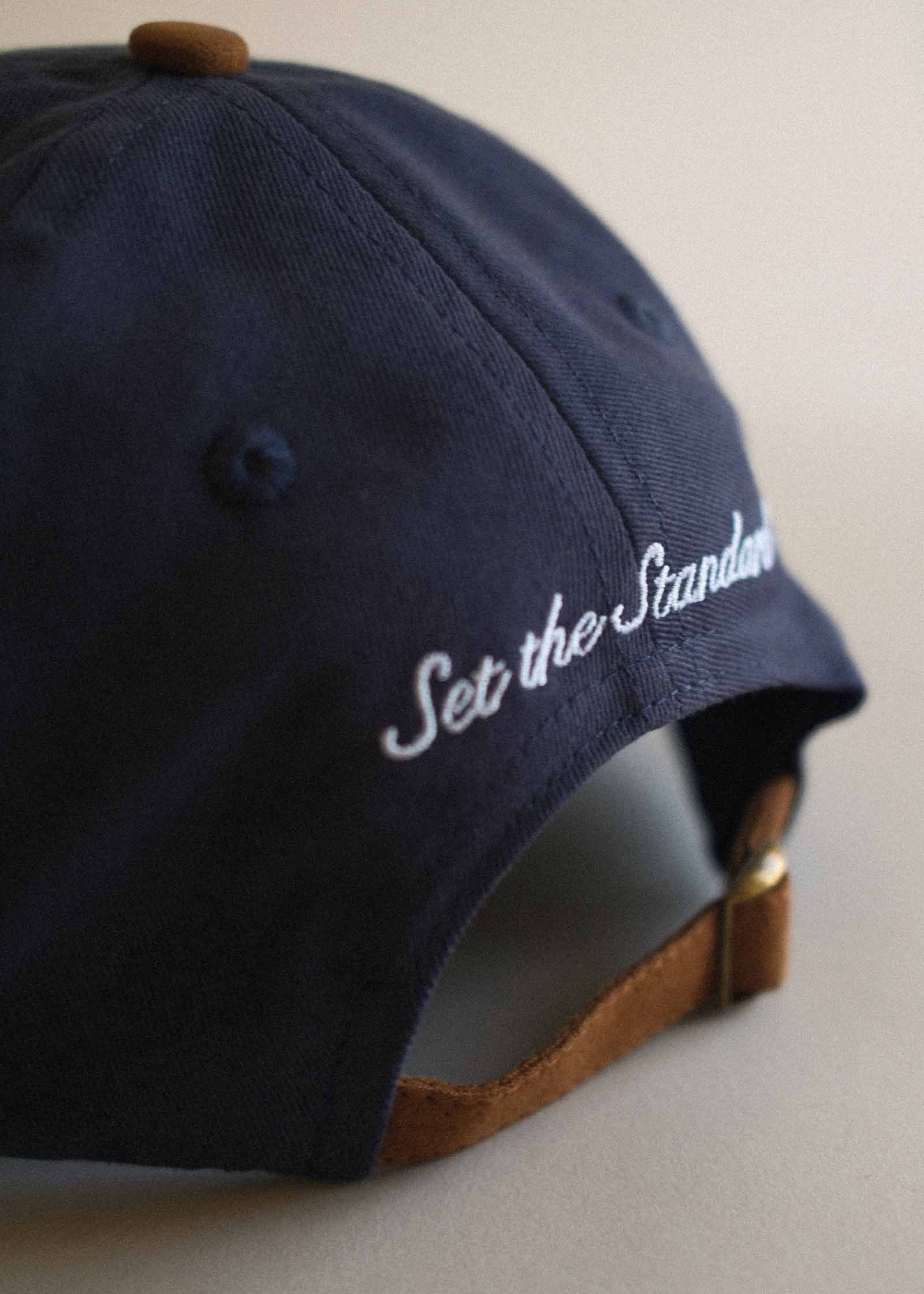 close up rear view of the Kinn x Prince The Court Cap showing "set the standard" embroidered