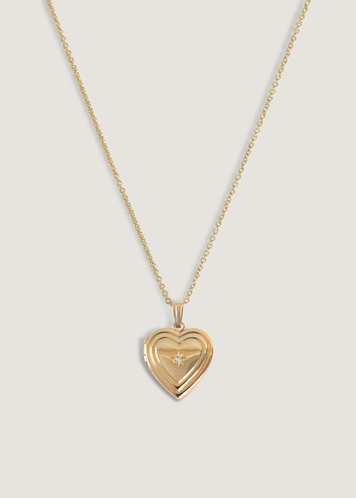 alt="Maison Ribbed Heart Locket Necklace II"