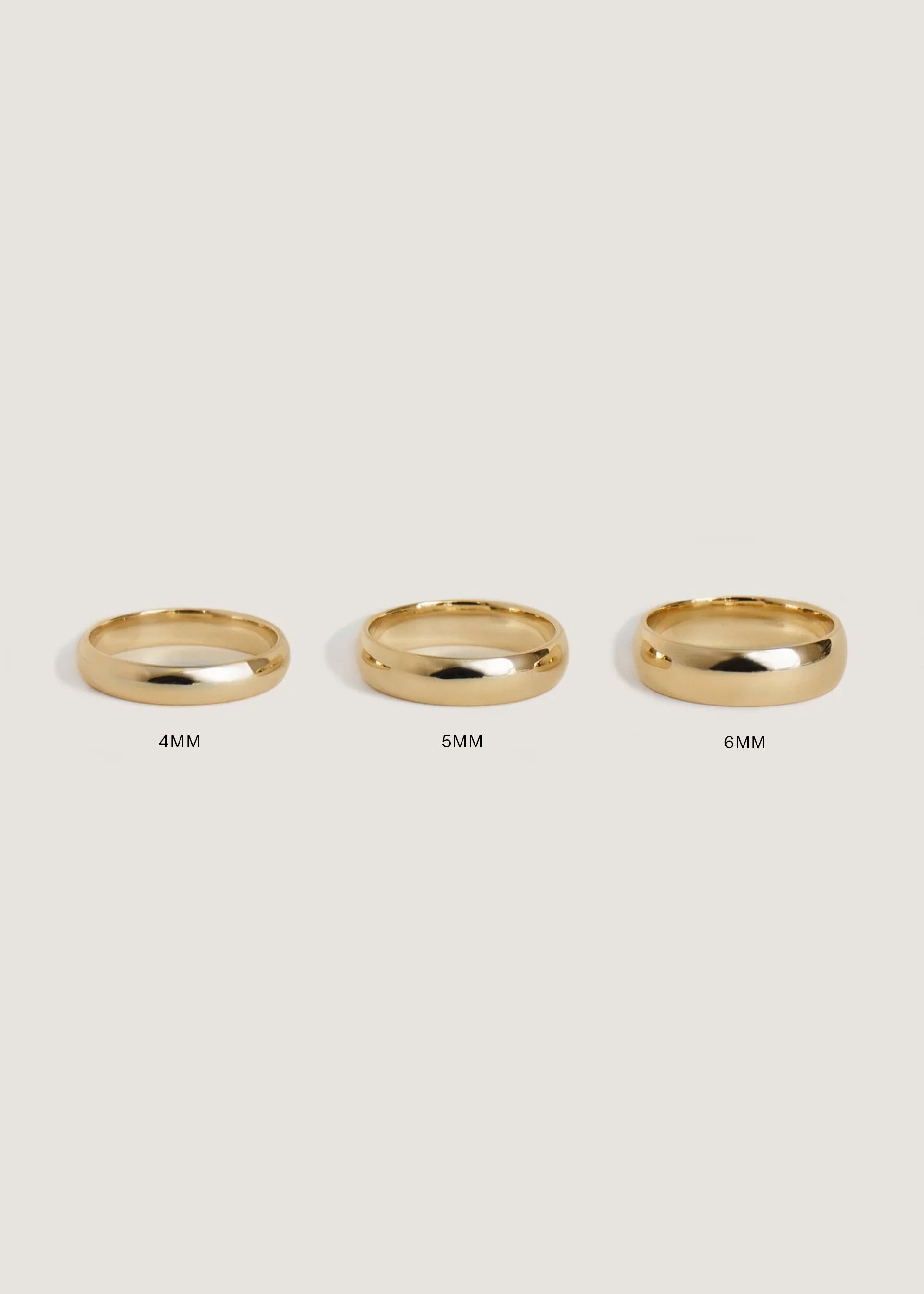 3 different widths of the Kinn 14k Gold Milo Wedding Band placed next to each other 4mm, 5mm, 6mm