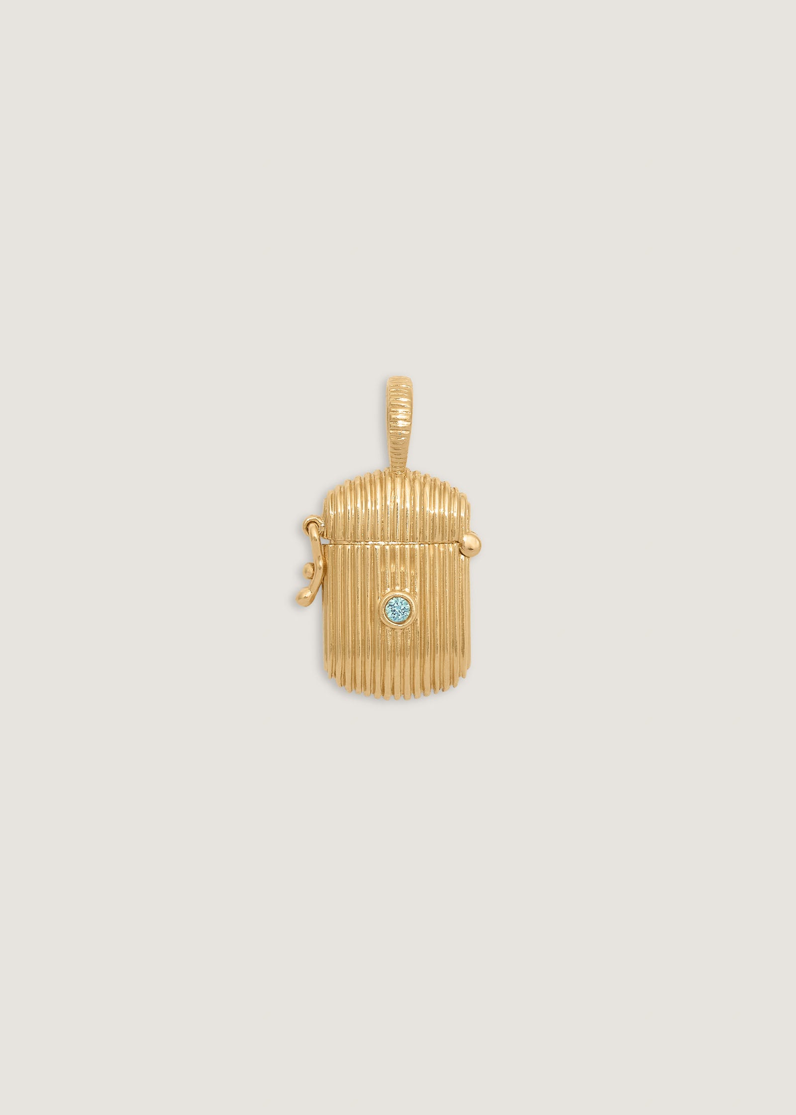 Kinn 14k Gold Relic Ribbed Locket Pendant with a bezel set round aquamarine
