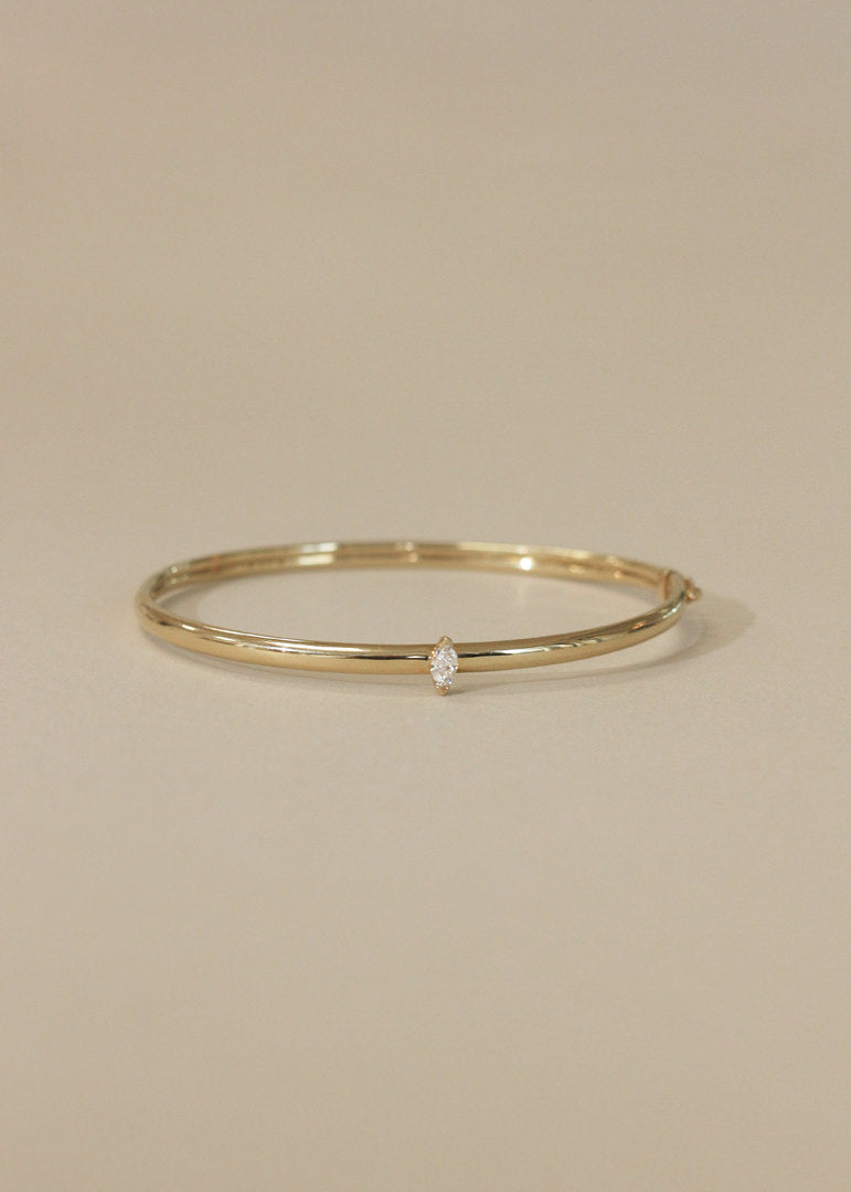 Kinn Vintage 14k Gold Bangle with Marquise Diamond