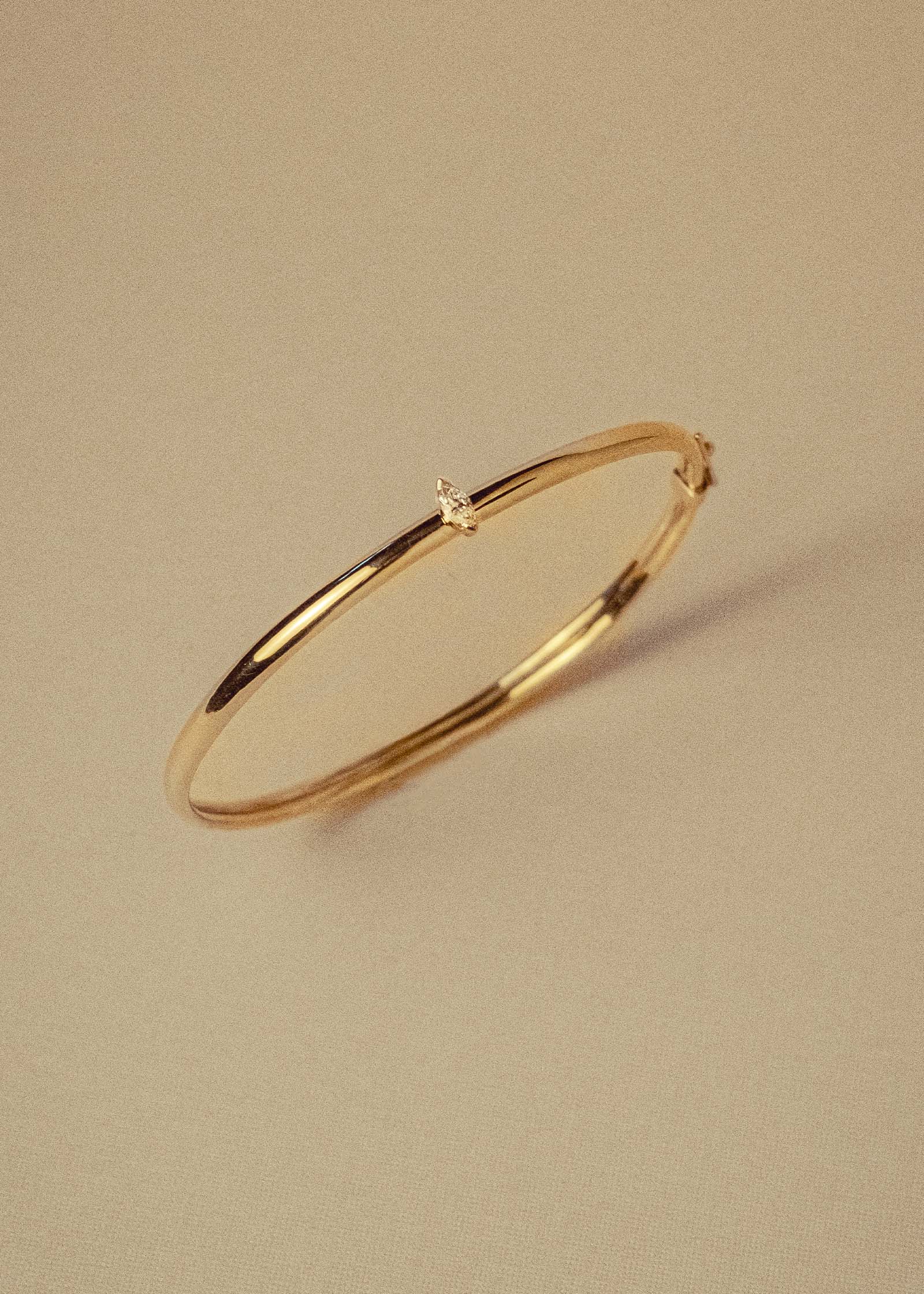 Kinn Vintage 14k Gold Bangle with Marquise Diamond