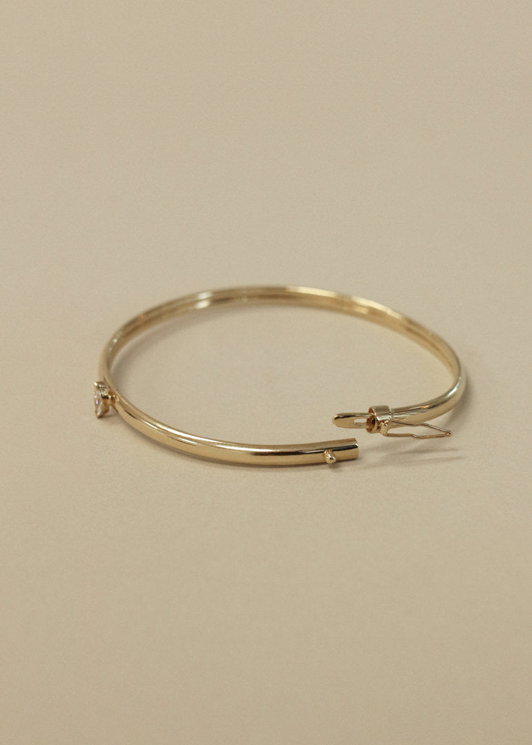 Open clasp of the Kinn Vintage 14k Gold Bangle with Marquise Diamond