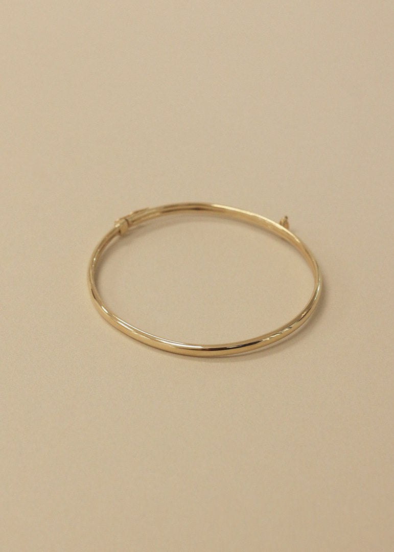 Kinn Vintage 14k Gold Bangle with Marquise Diamond