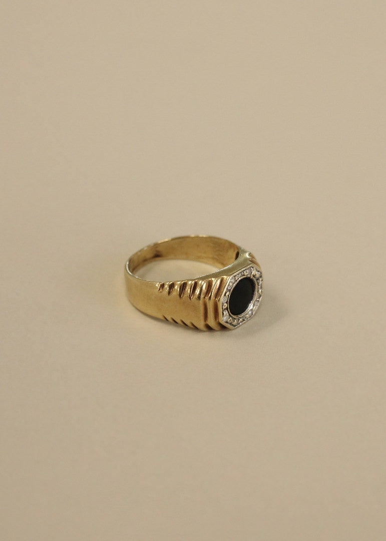 Front angled view of the Kinn Vintage 14k Gold Octagon Ribbed Onyx Ring