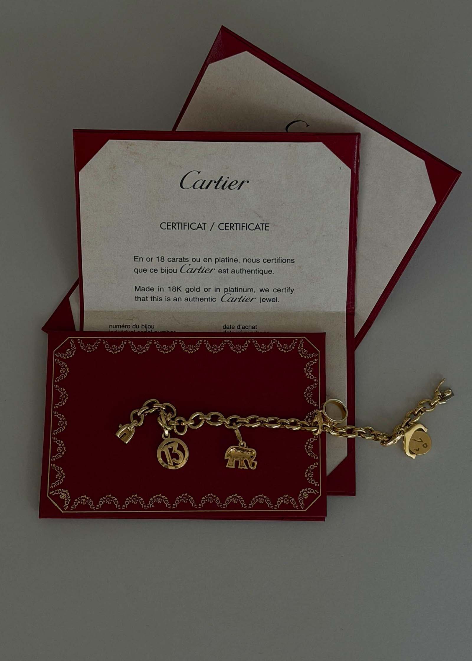 Certificate for the Kinn Vintage 18k Gold Cartier Charm Bracelet