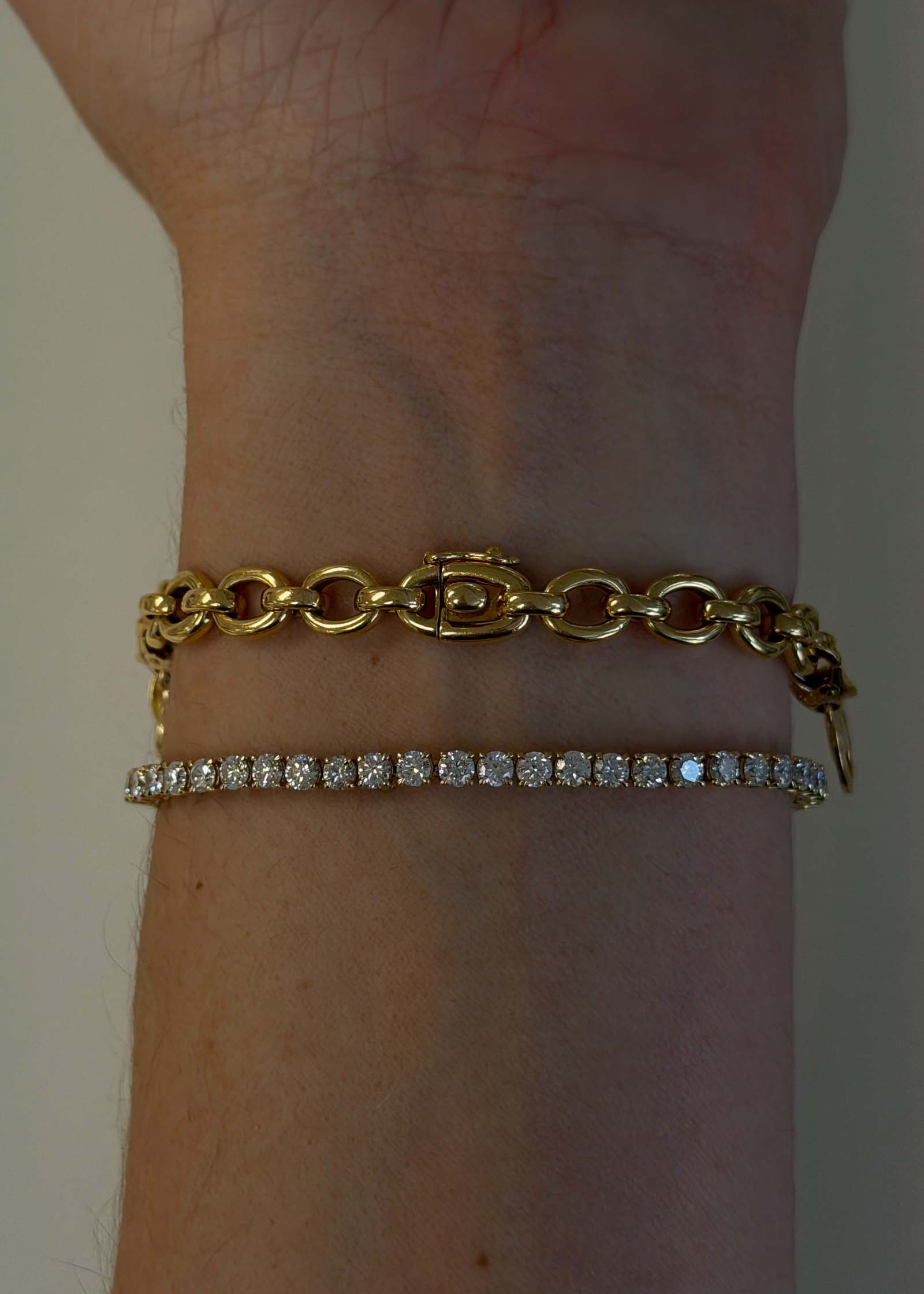 Kinn Vintage 18k Gold Cartier Charm Bracelet worn on wrist showing the clasp