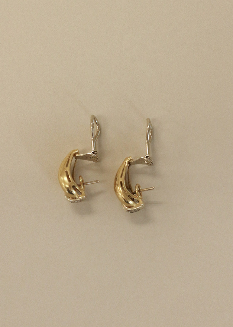 Side view of a pair of Kinn Vintage 18k Gold Tubular Teardrop Pavé Earrings