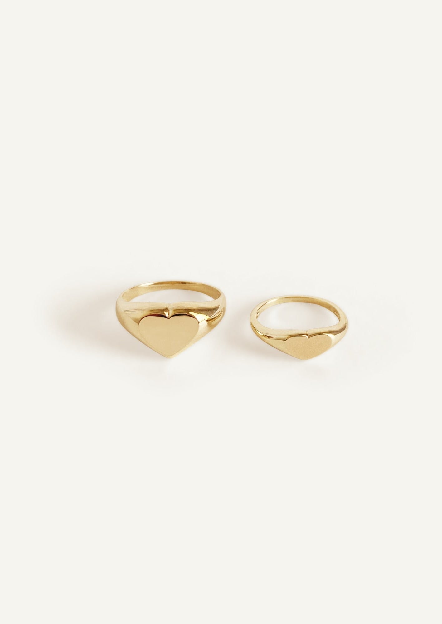 alt="Classic Heart Signet Ring compared to the petite heart signet ring"