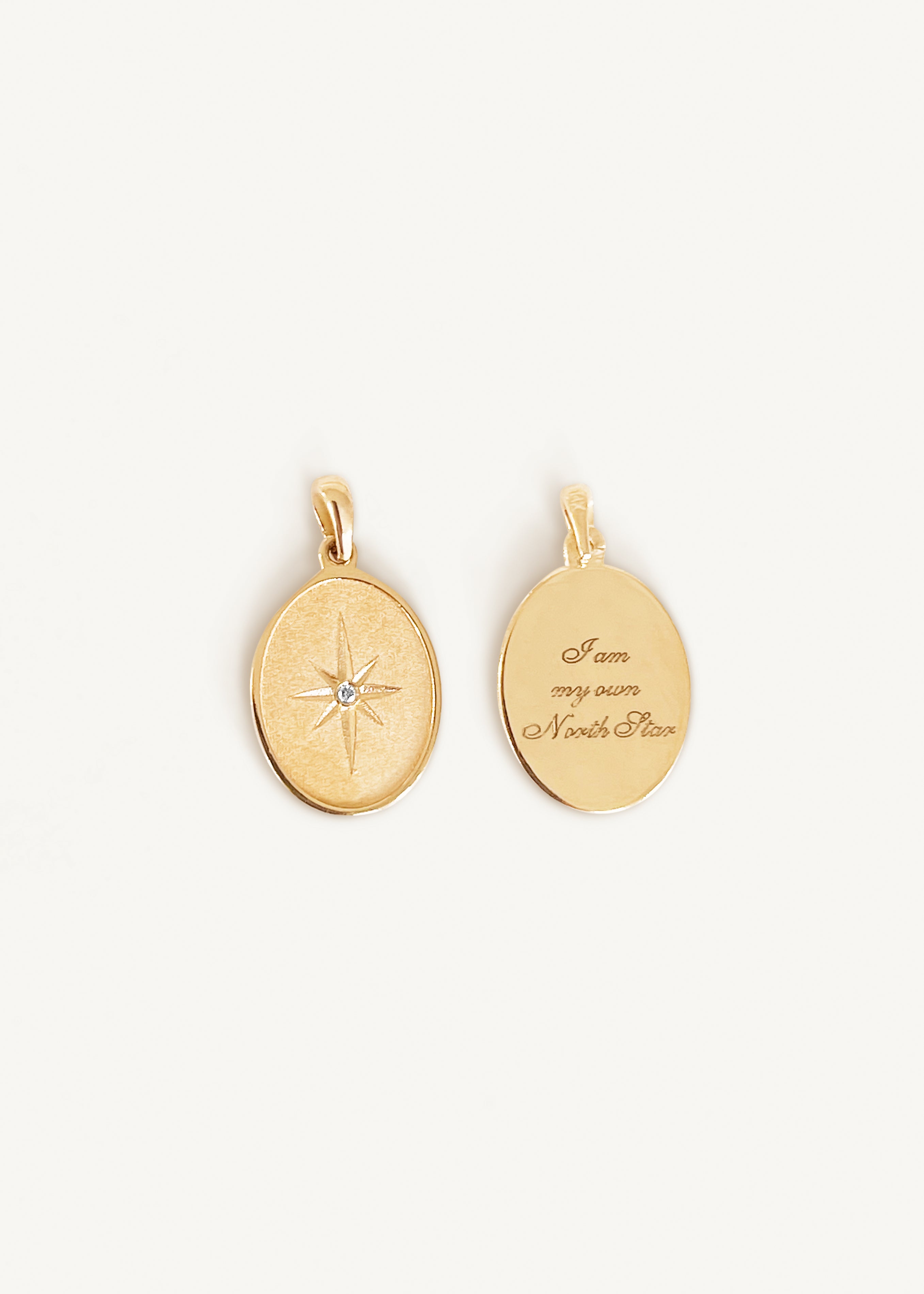 alt="back and front of Mother.ly x Kinn North Star Pendant"