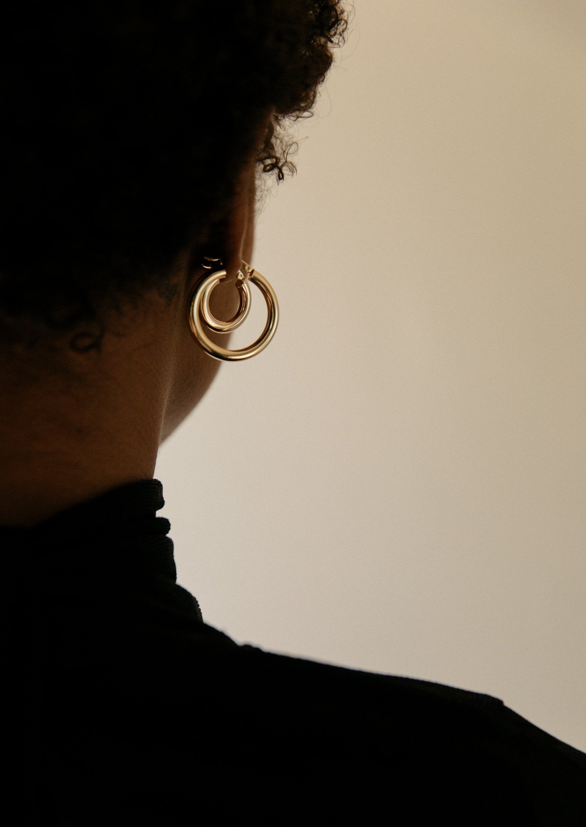 alt="Classic Hoop Earrings - Small styled with the medium classic hoop earring"