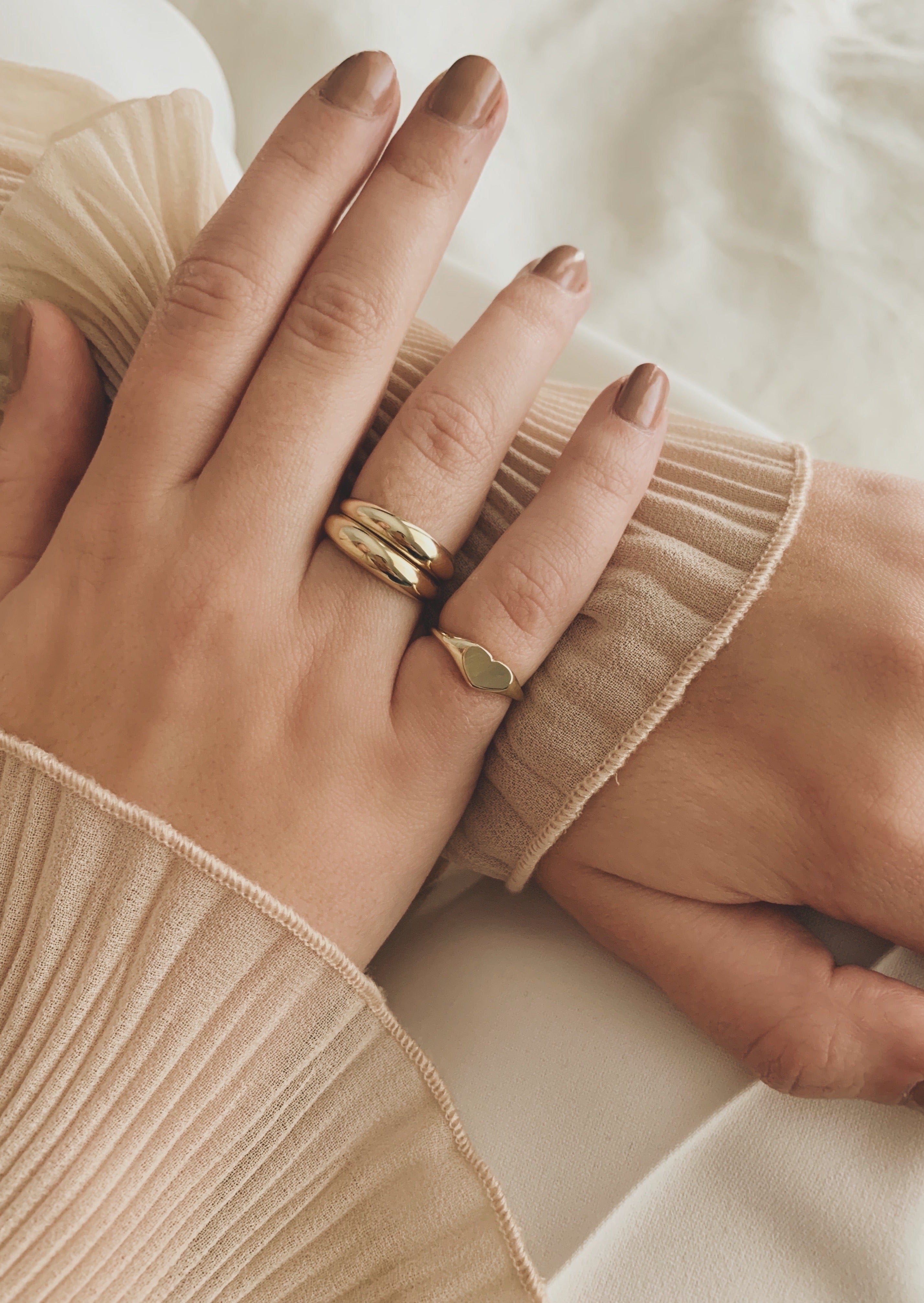 alt="Double Dare To Love Dome Ring (Gold & Gold) styled with the petite heart signet ring"