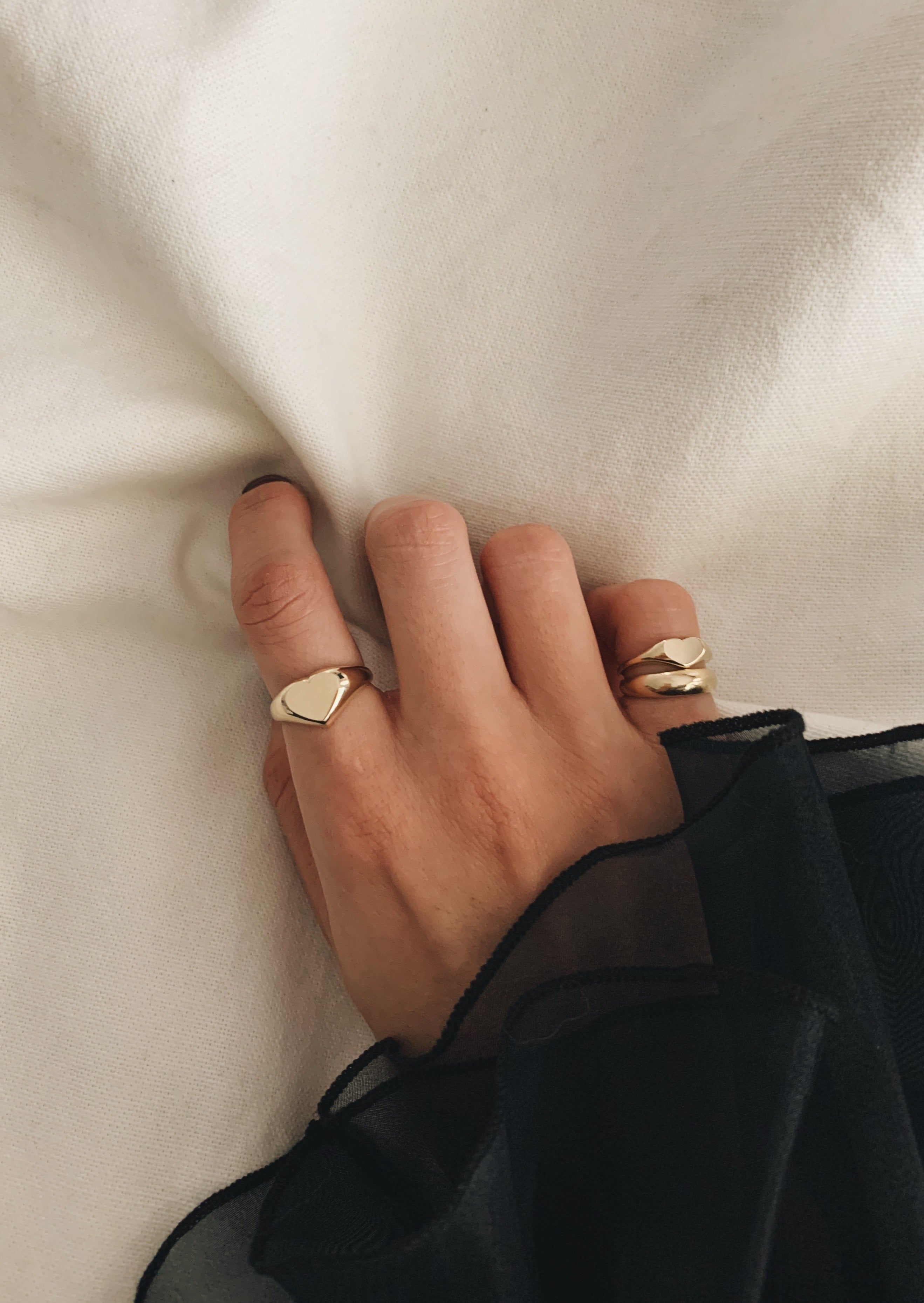 alt="Classic Heart Signet Ring styled with petite heart signet ring and dare to love dome ring I"