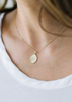 alt="Mother.ly x Kinn North Star Necklace"