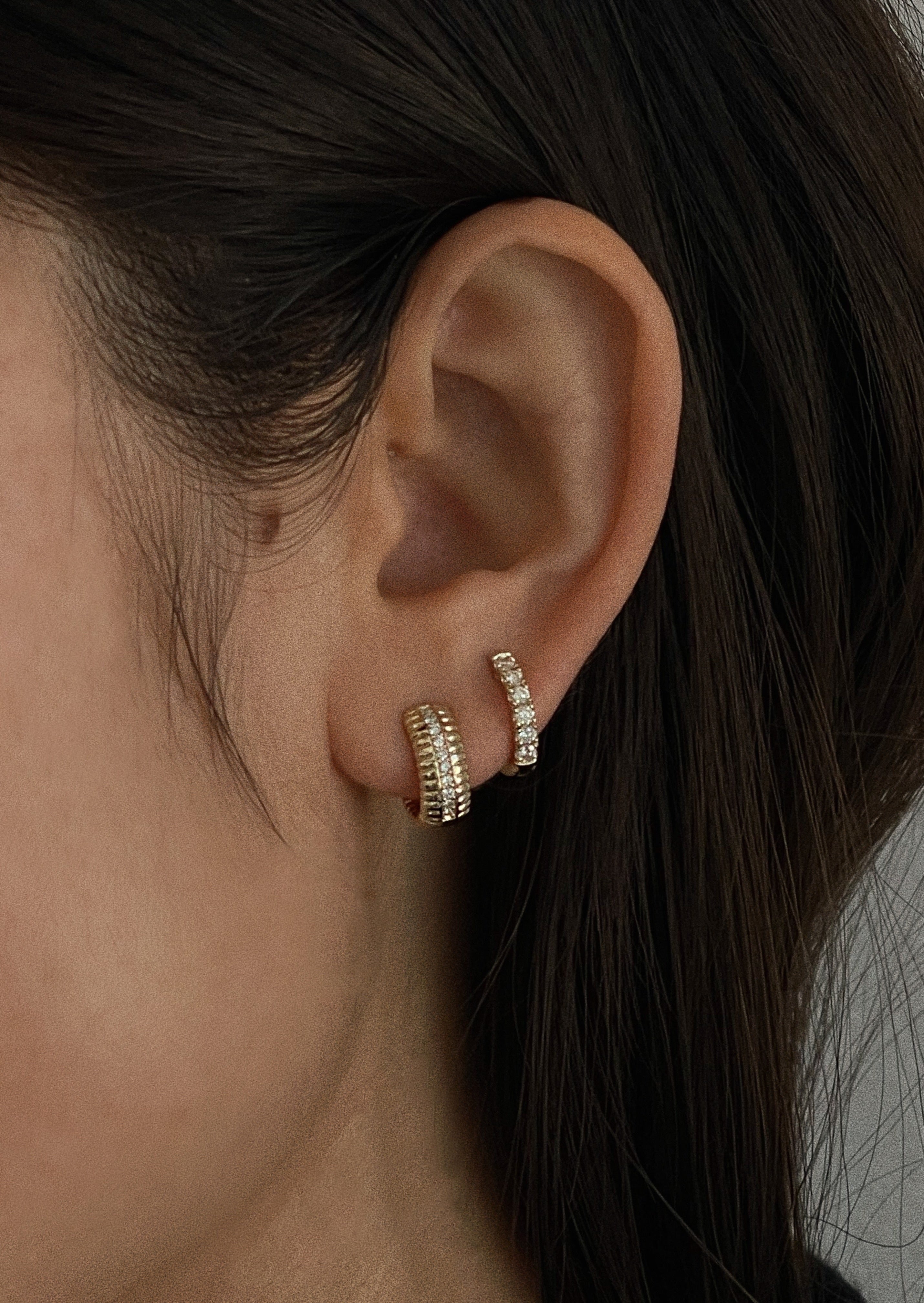 alt="Pavé Hoop Huggie Earrings II with solis ribbed pave earrings"