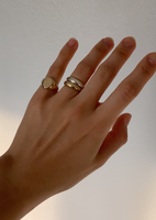 alt="classic signet ring styled with a double dare to love dome ring gold and silver"
