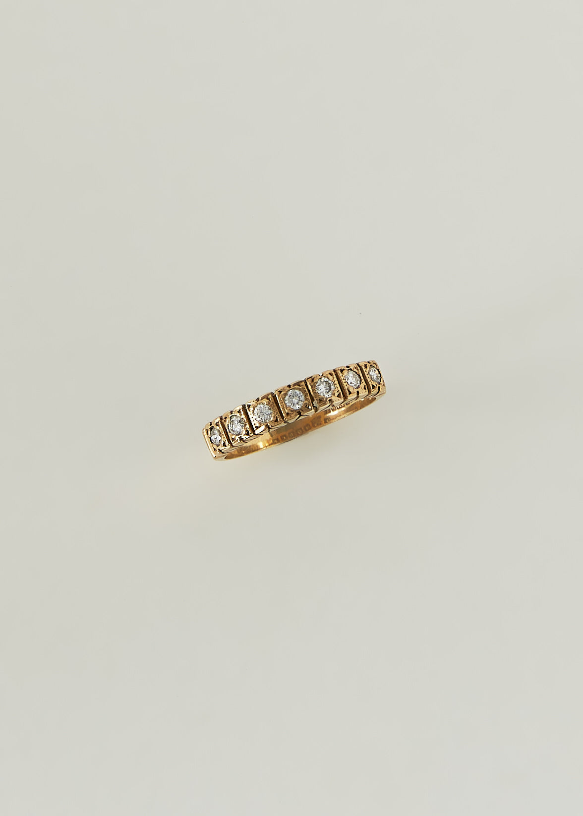 alt="Vintage Seven Round Diamond Ring"