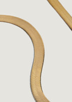 alt="close up of Carter Flat Herringbone Chain III"