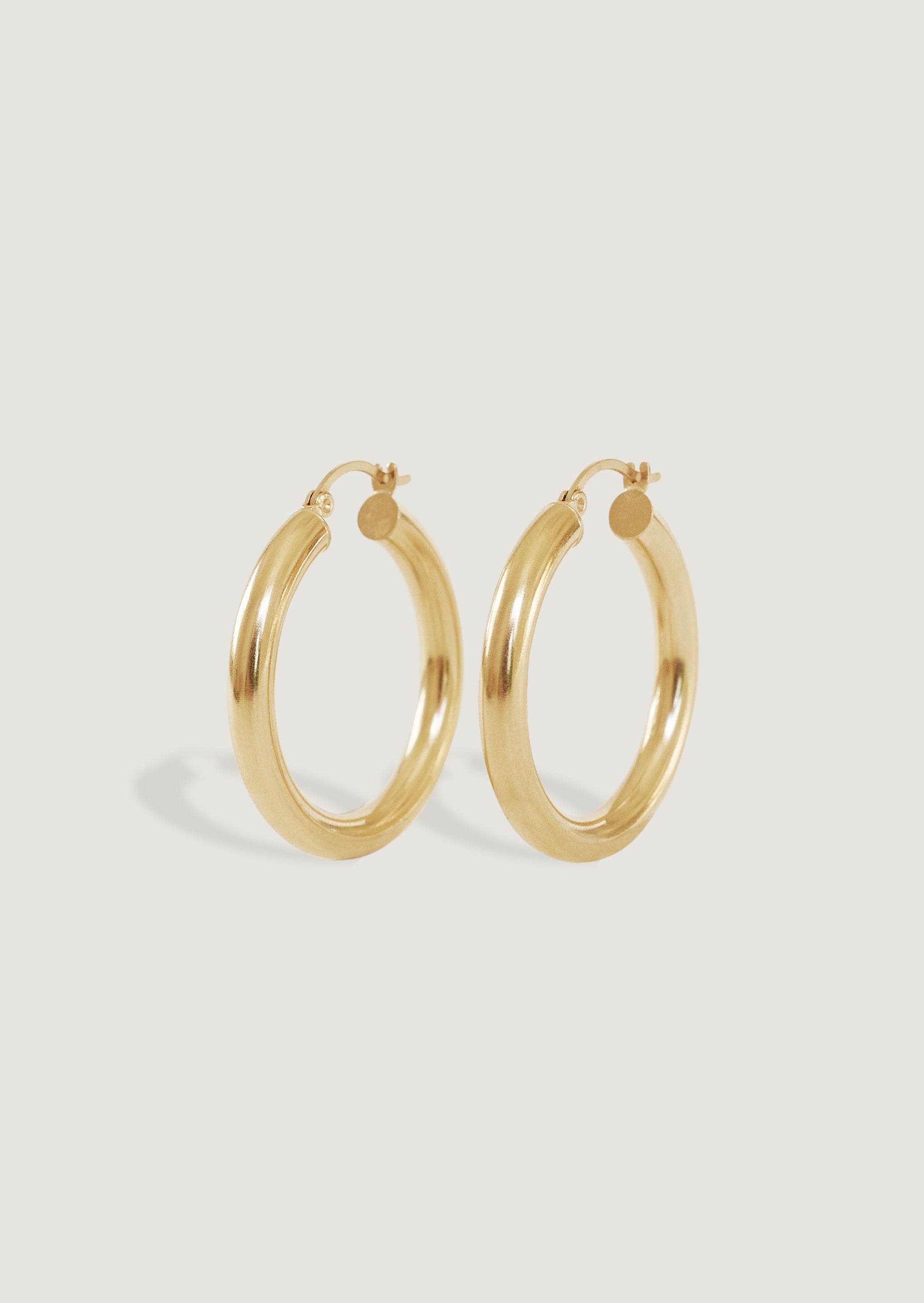 Kinn Studio 14k solid gold large classic hoop earrings