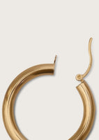 alt="close up of Classic Hoop Earrings - Large"