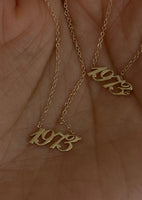 alt="1973 14K gold necklace"