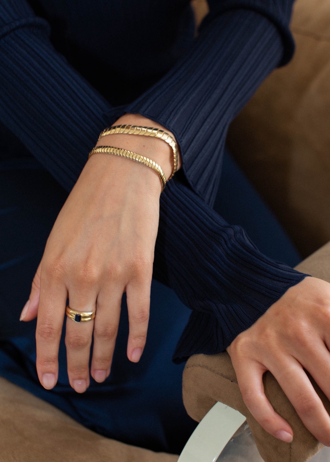 alt="Françoise Stacked Ellipse Ring II - Blue Sapphire styled with the Cobra I and I chain bracelet"