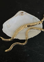 alt="Cobra Chain Bracelet II next to the cobra chain bracelet I"