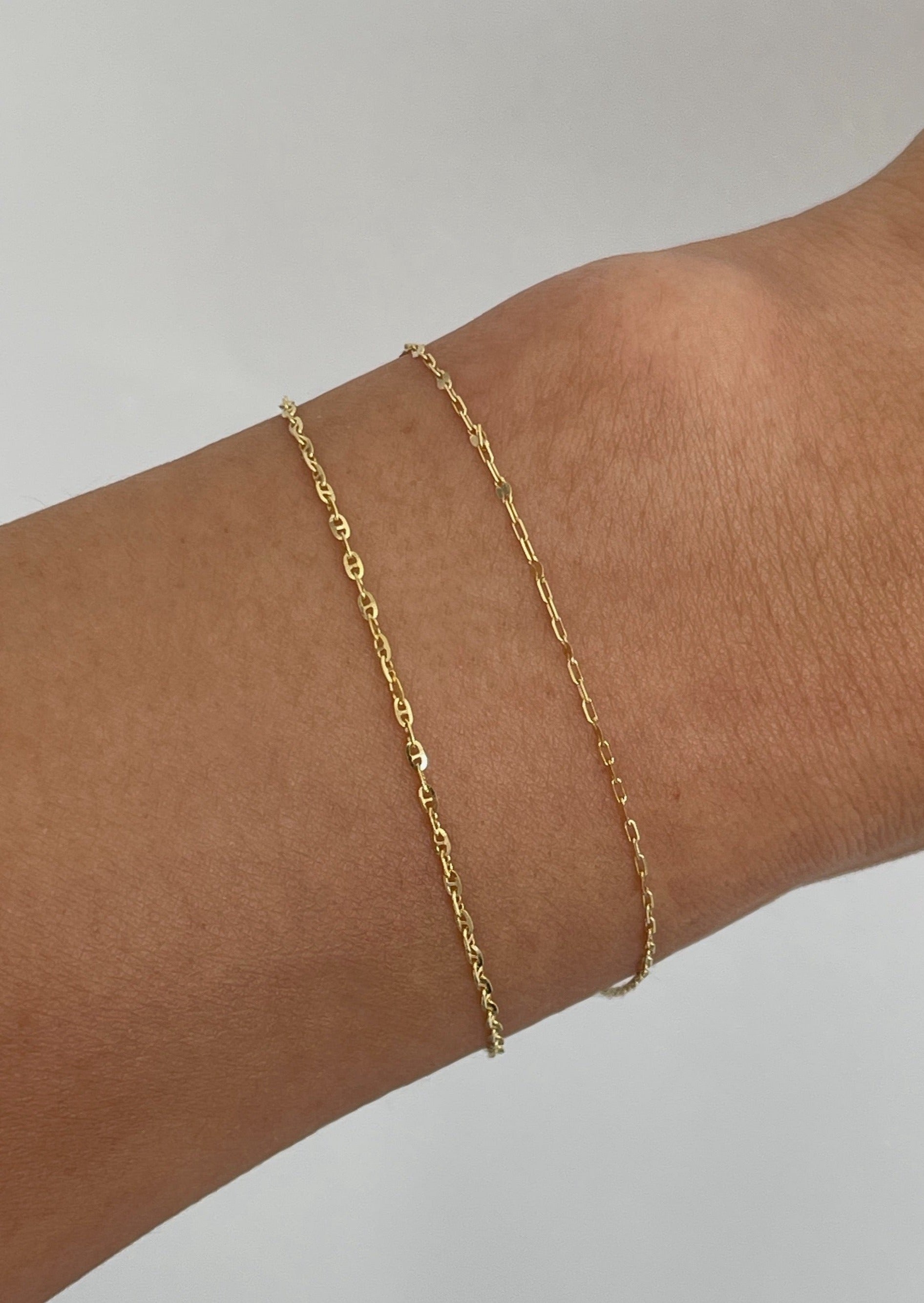 alt="Mariner Chain Bracelet and diamond cut rolo bracelet"