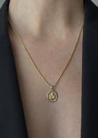 alt="Elusive Cherub Necklace with petite rope chain"