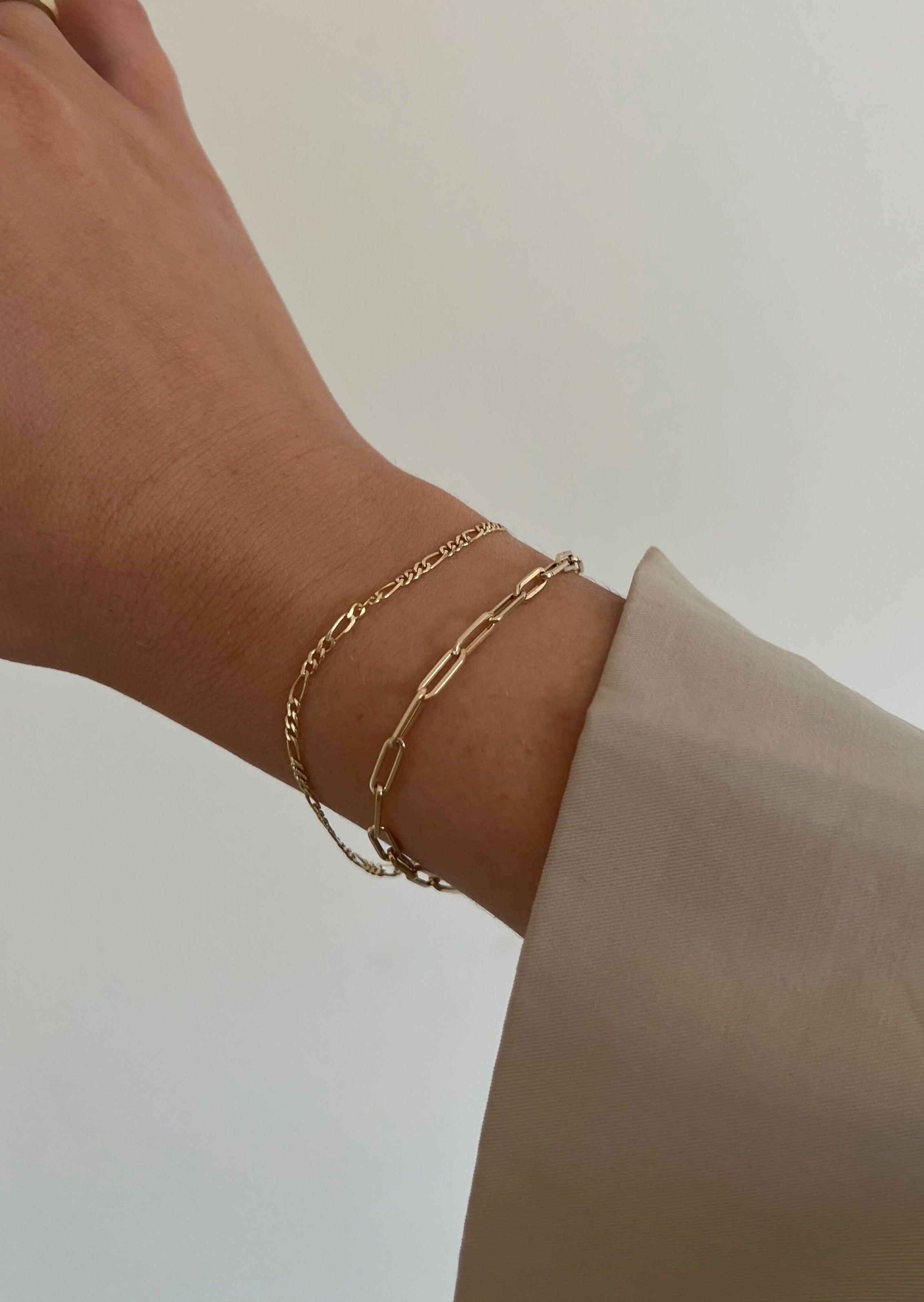 alt="Petite Link Chain Bracelet with kyle figaro bracelet"