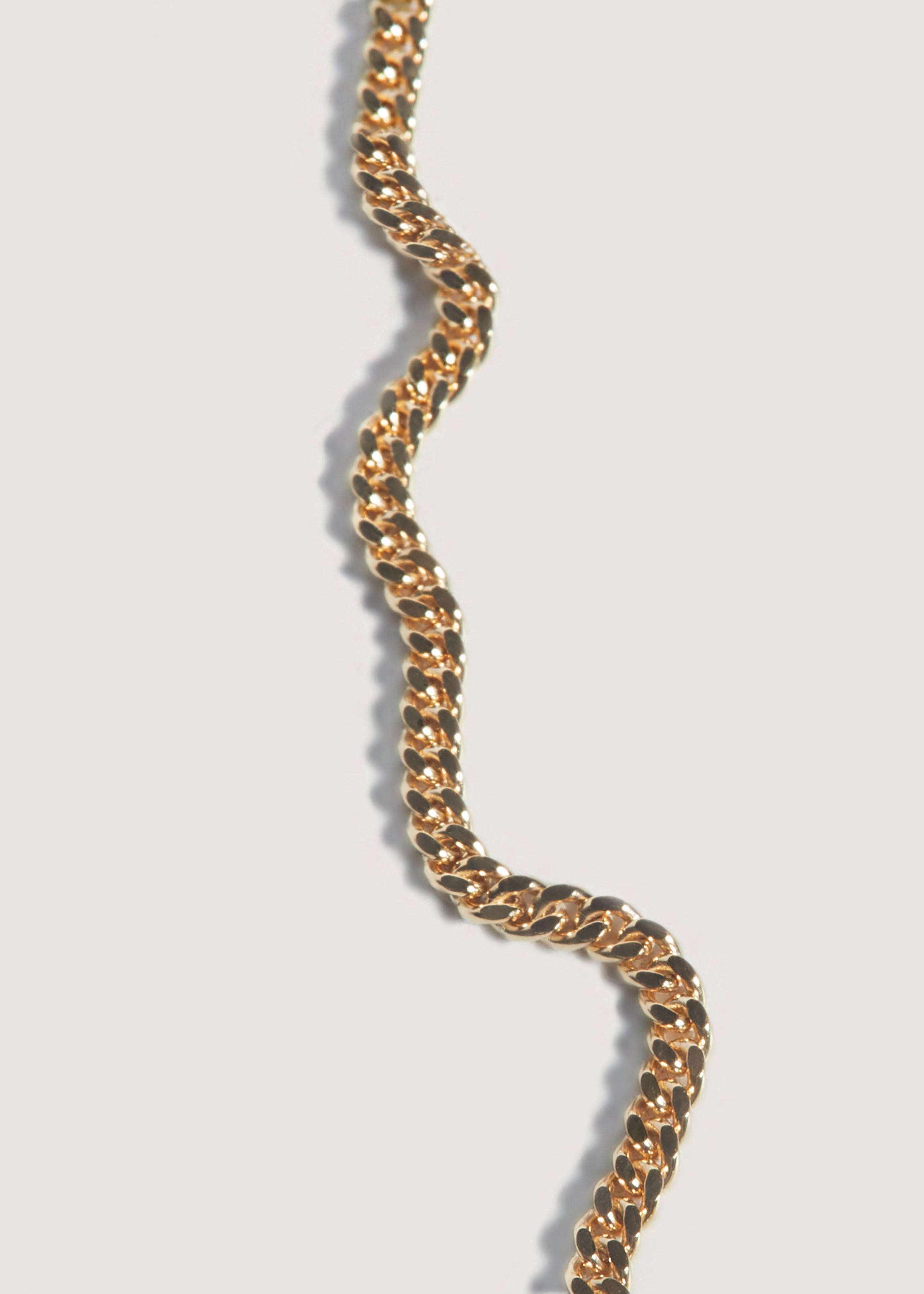 alt="close up of Petite Capri Curb Chain Necklace"