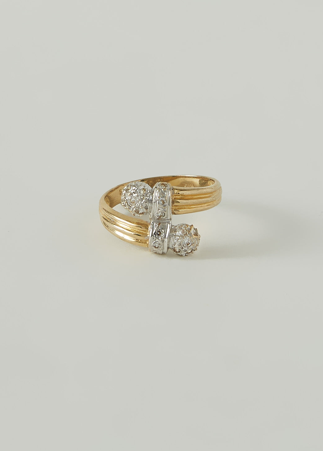 alt="Vintage Overlapping Round Diamond Ring"