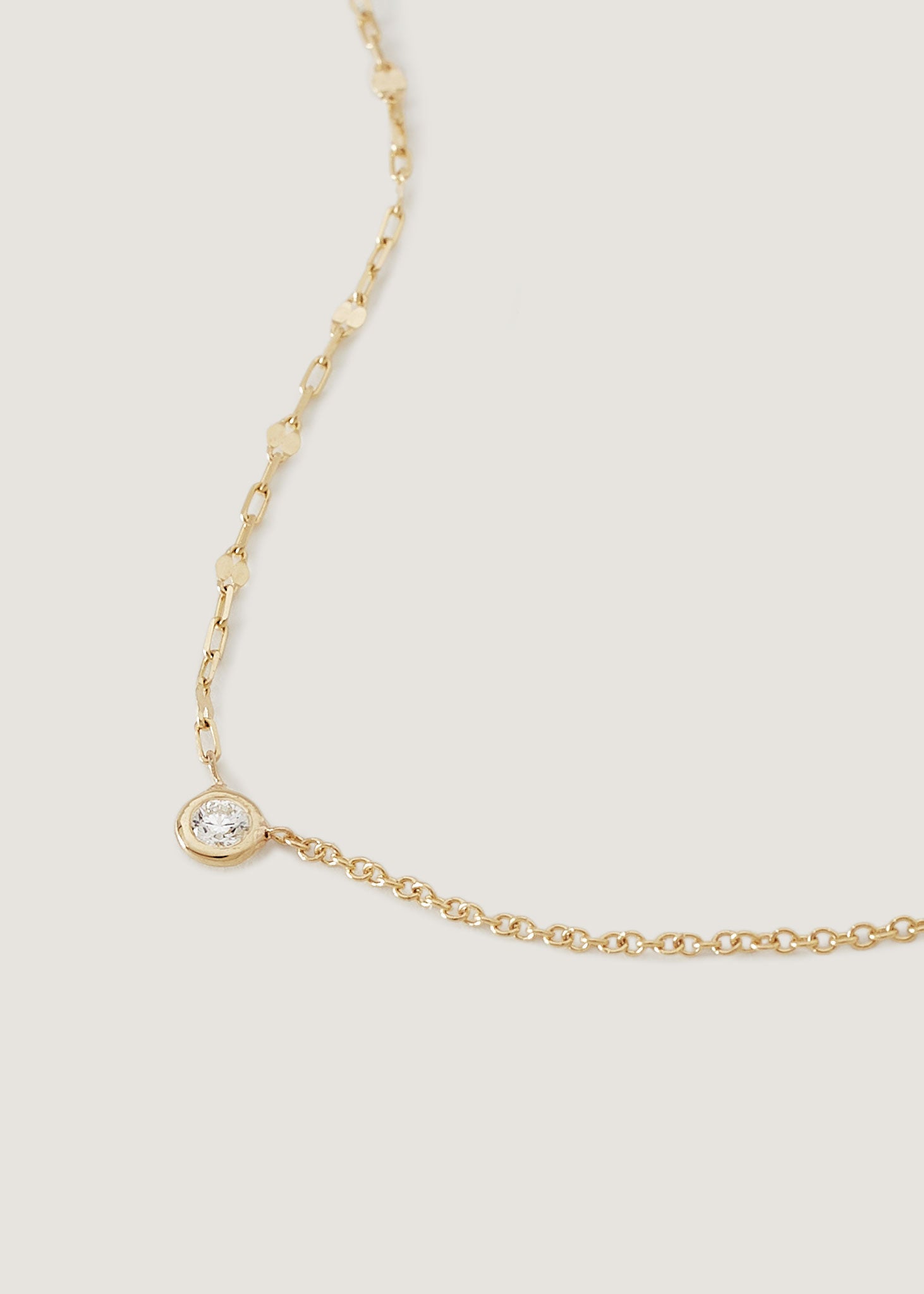 alt="two in one round diamond necklace"