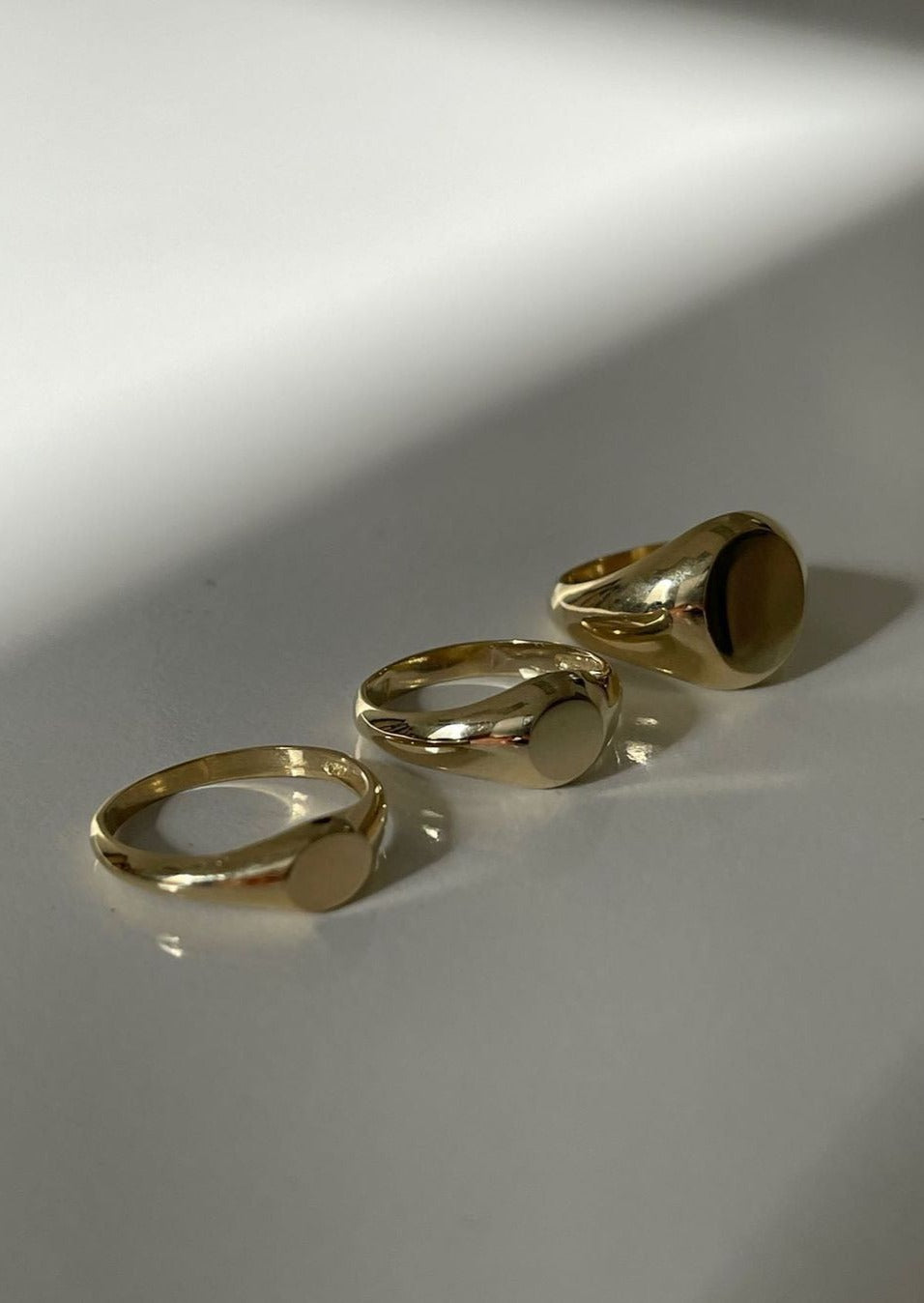 alt="Petite Signet Ring with medium signet ring and classic signet ring"
